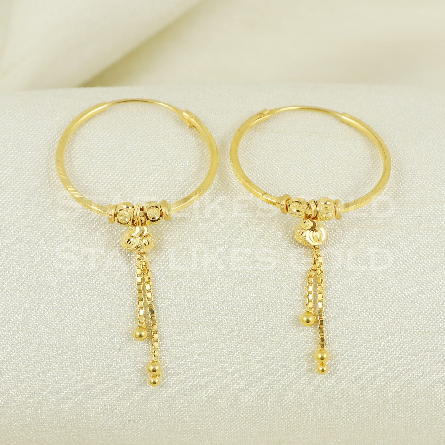 18 karat 18k gold bali hoop earrings